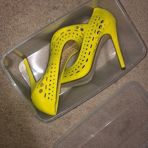 Yellow 4.5 inch heels. Never worn
